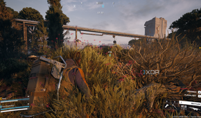 Hiding in grass in Arc Raiders.