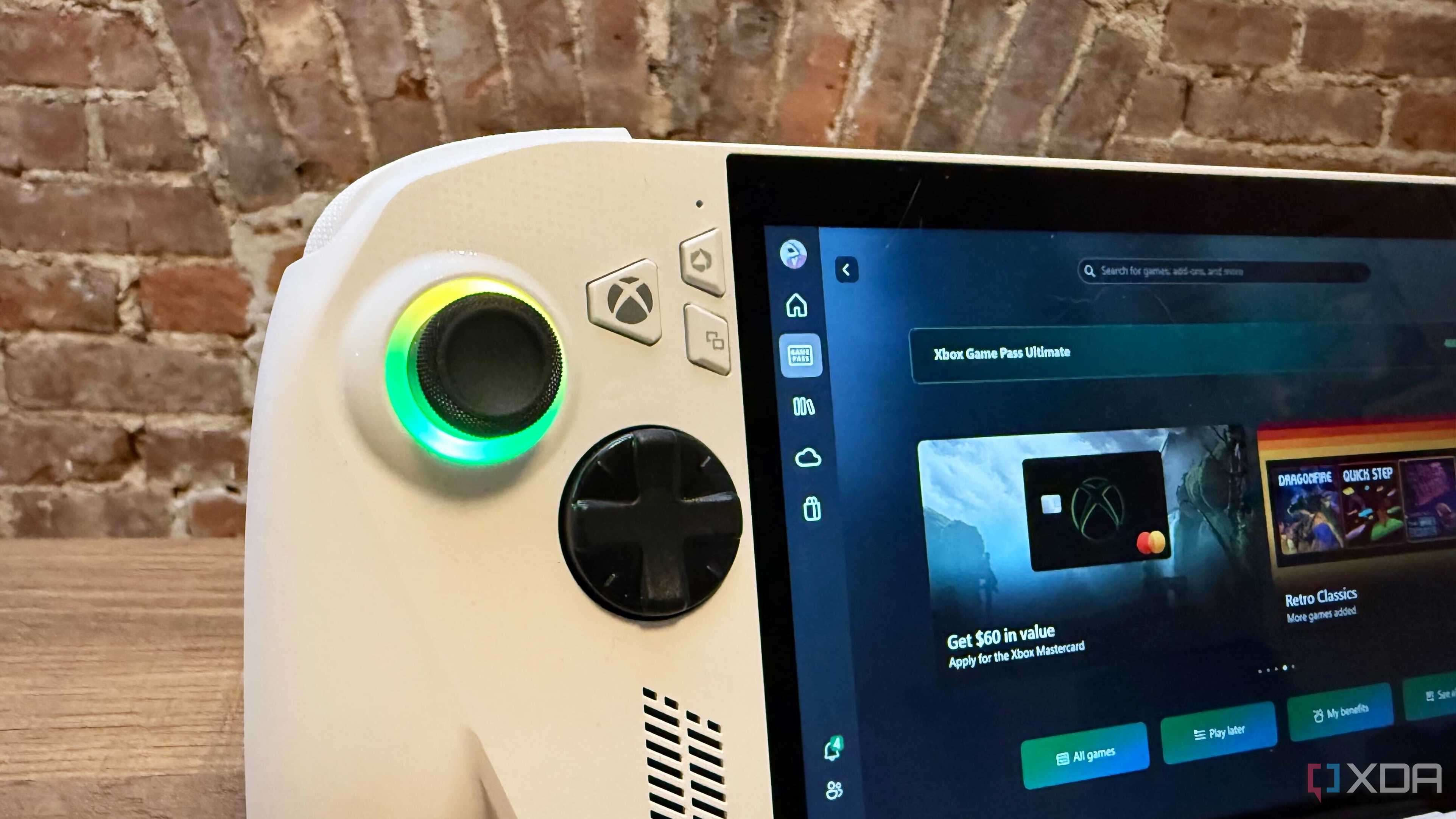 Close-up on the RGB lights on the Asus ROG Xbox Ally thumbsticks.