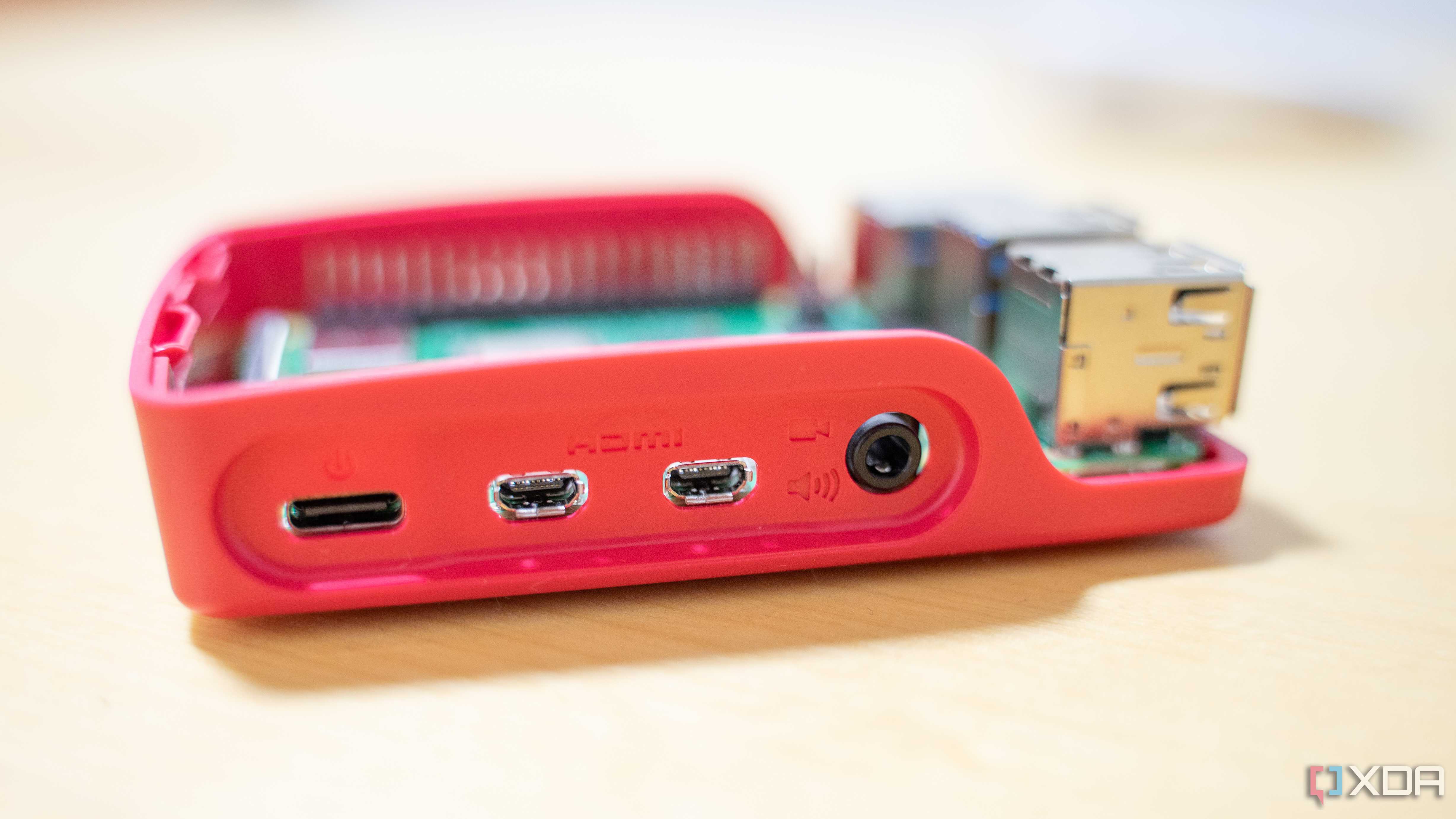The Raspberry Pi's USB-C ports and audio jack on its edge.