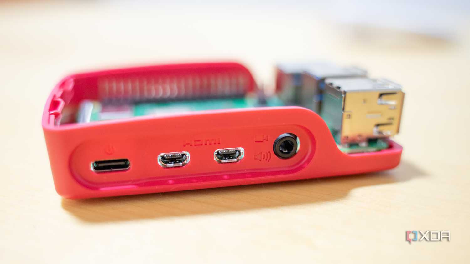 The Raspberry Pi's USB-C ports and audio jack on its edge.