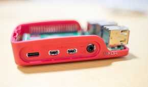 The Raspberry Pi's USB-C ports and audio jack on its edge.