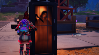 Stepping into a Ghostface phone booth in Fortnitemares 2025.