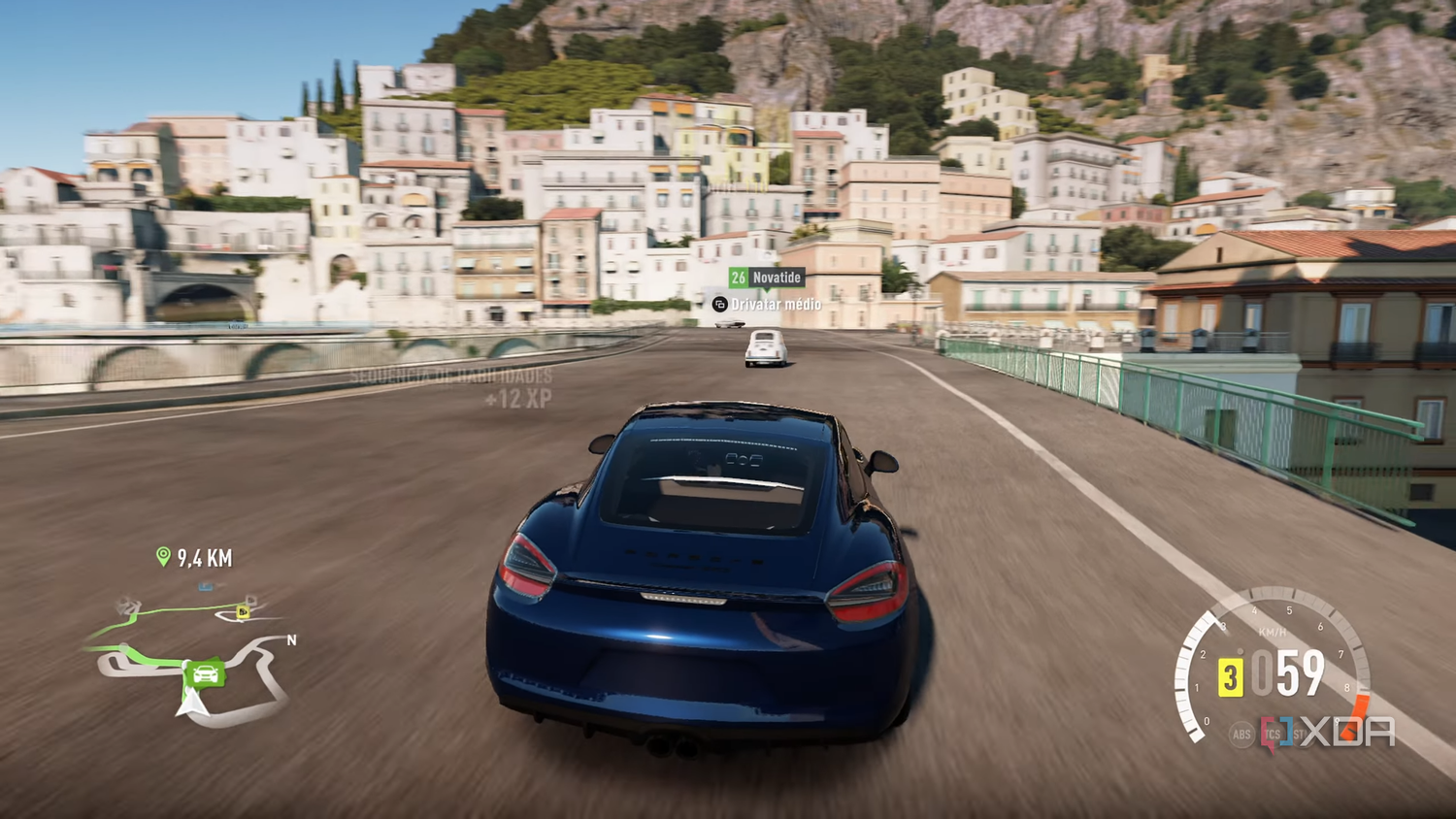 A blue Porsche racing down the Italian coast in Forza Horizon 2.