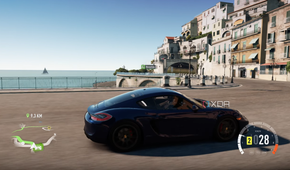 A blue Porsche racing down the Italian coast in Forza Horizon 2.