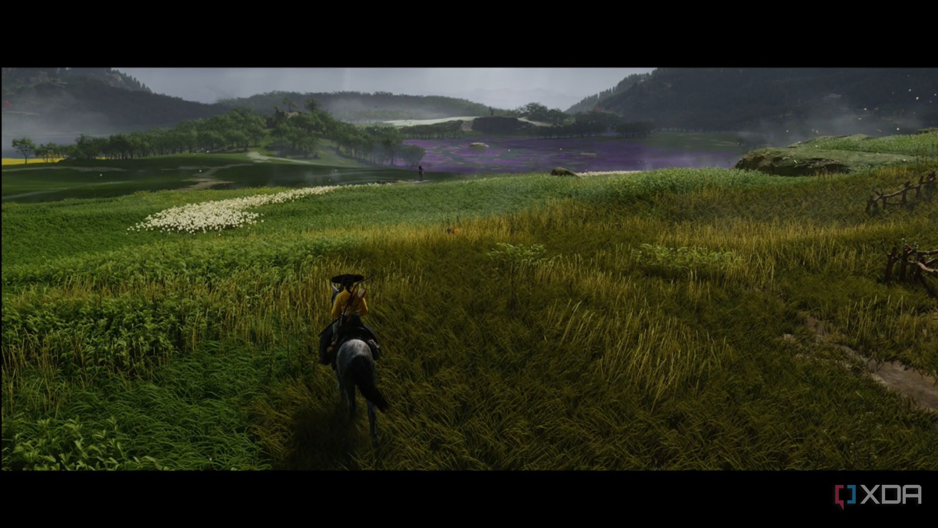 A screenshot of Atsu riding a horse in Ghost of Yotei