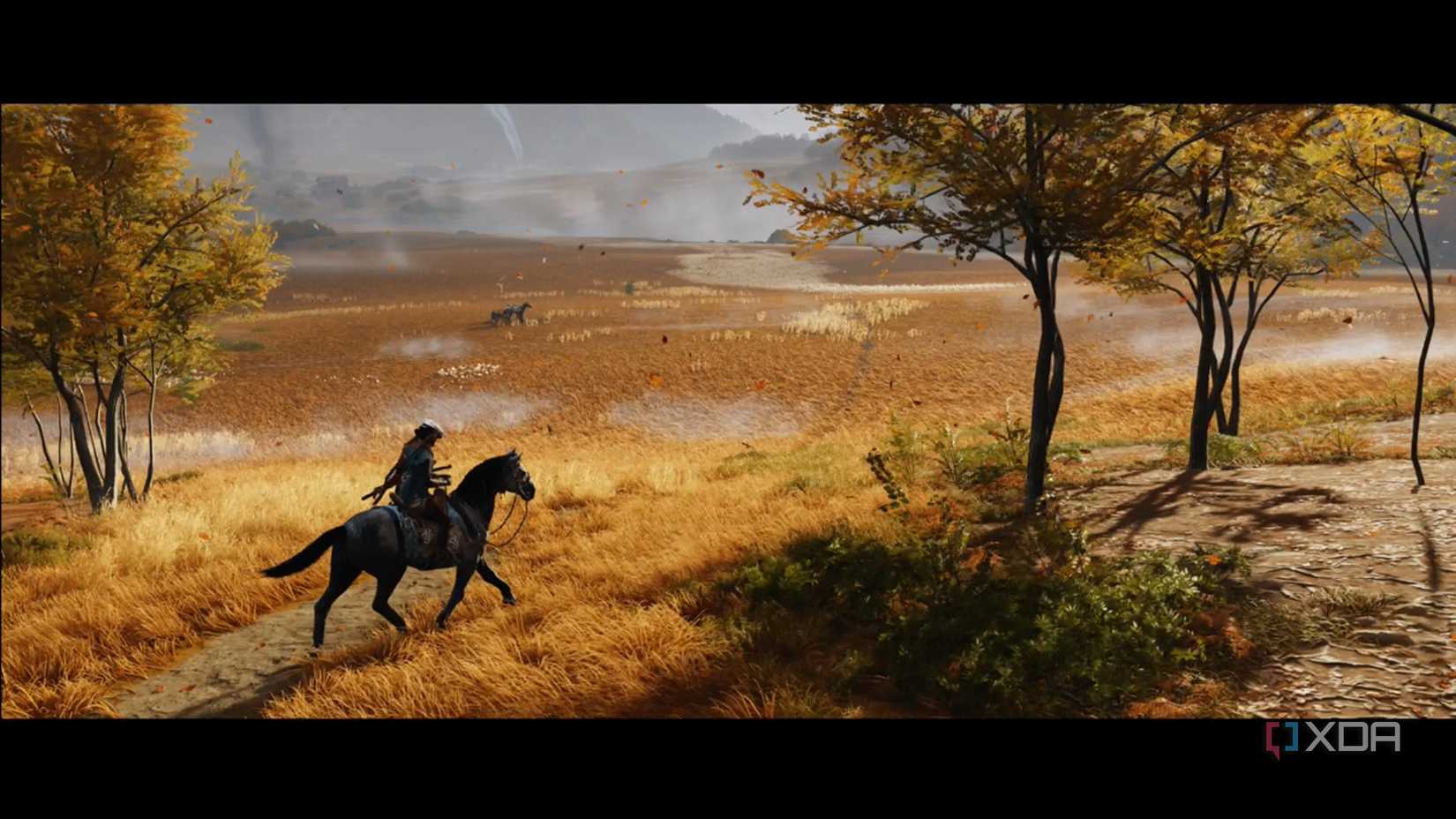 A screenshot of Atsu riding through a field on horseback in Ghost of Yotei