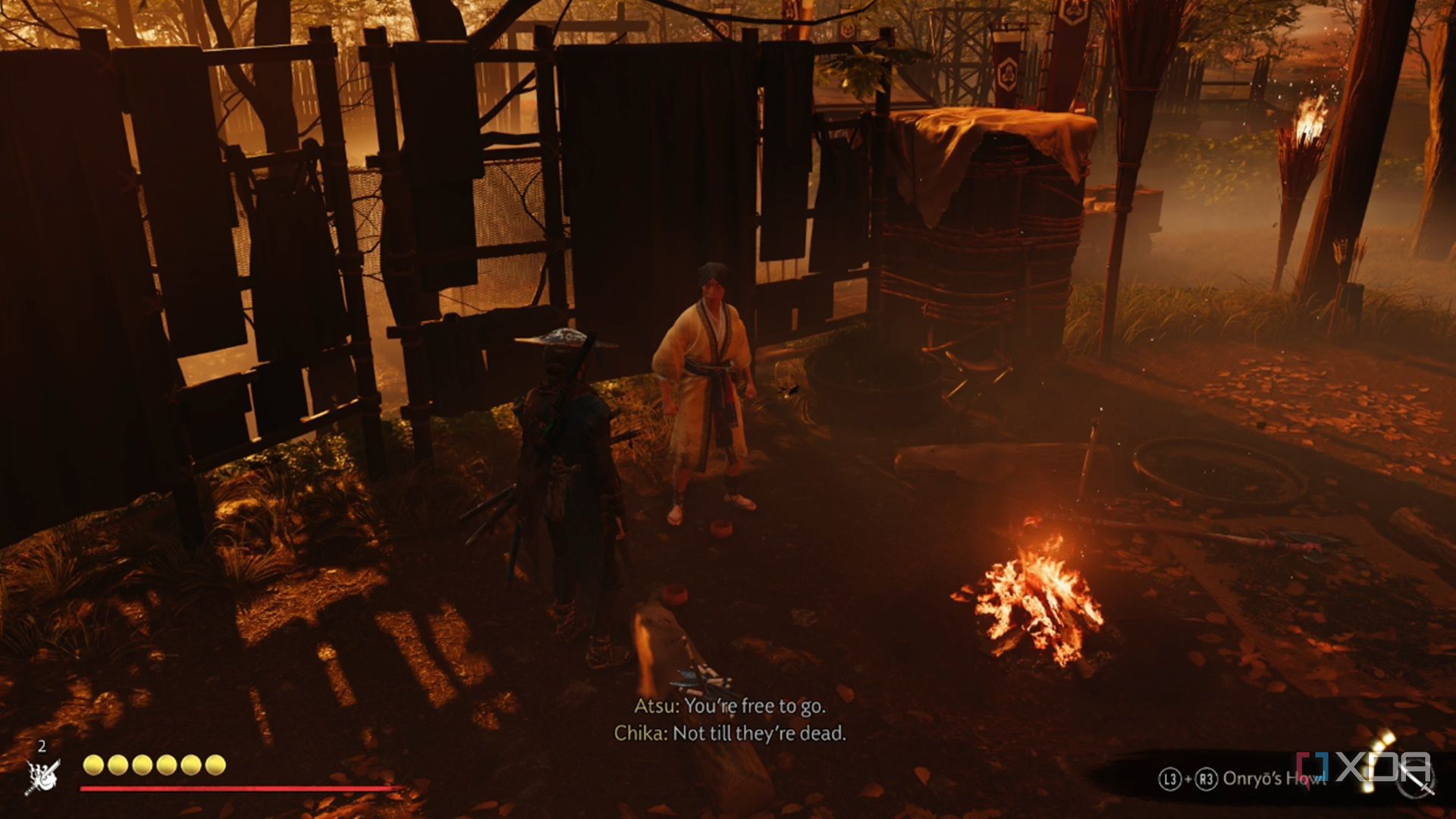 A screenshot of Atsu rescuing a prisoner in Ghost of Yotei
