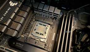 A photo of a CPU with old thermal paste on it