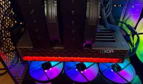 A photo of a PC build with RGB fans