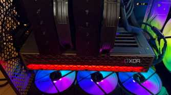A photo of a PC build with RGB fans