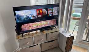 A photo of a gaming pc inside a Fractal case in a living room