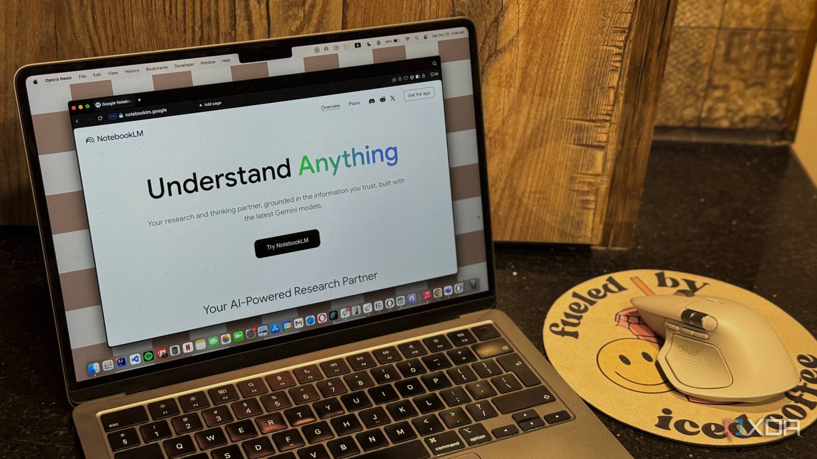 NotebookLM Home Page displayed on a Mac next to a Logitech MX Master 4 mouse