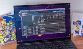 A laptop showing the Proxmox web UI showing information about the selected node