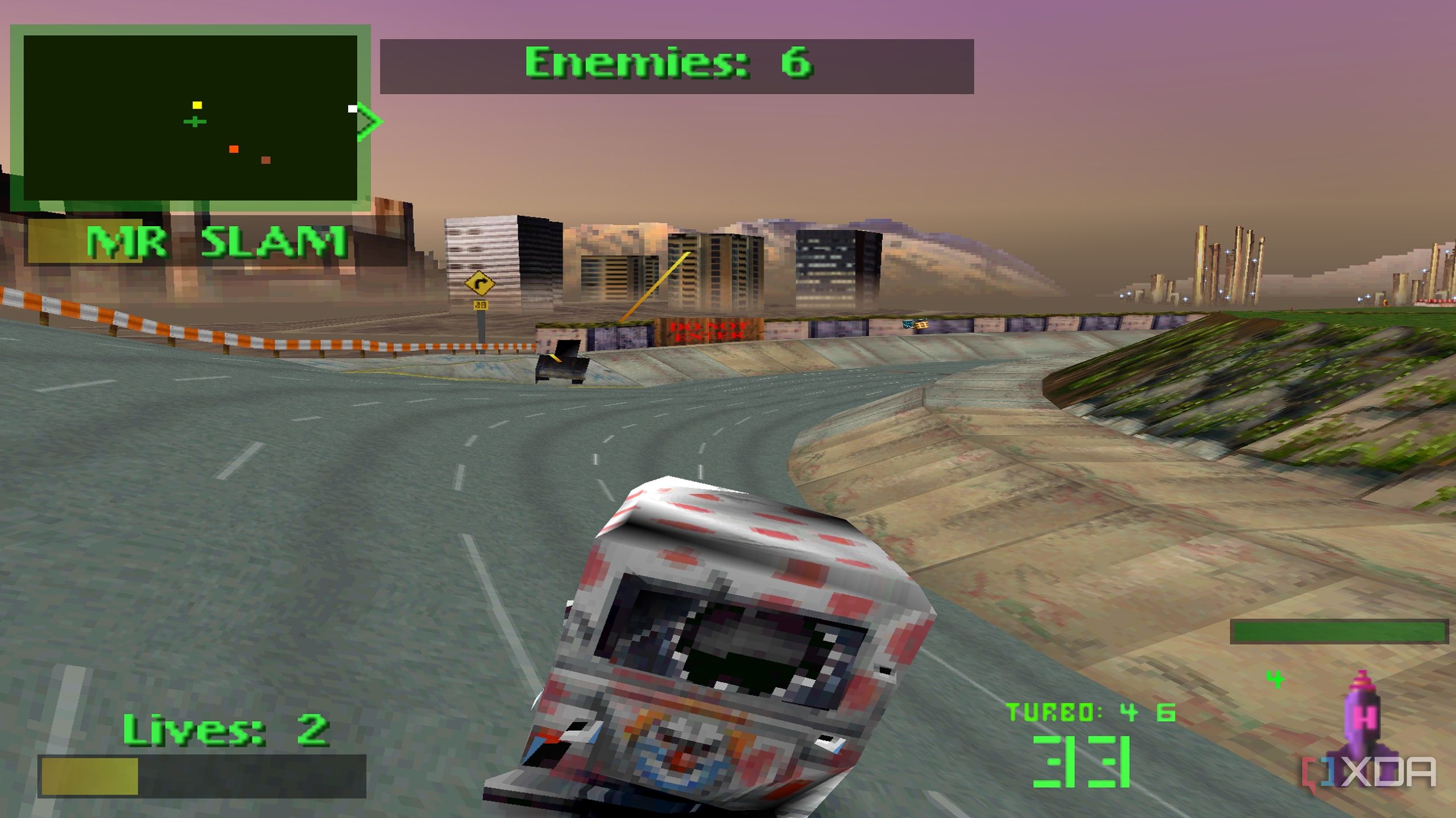 Damaged and burnt Sweet Tooth's ice-cream truck in Twisted Metal 2 on the PS2.