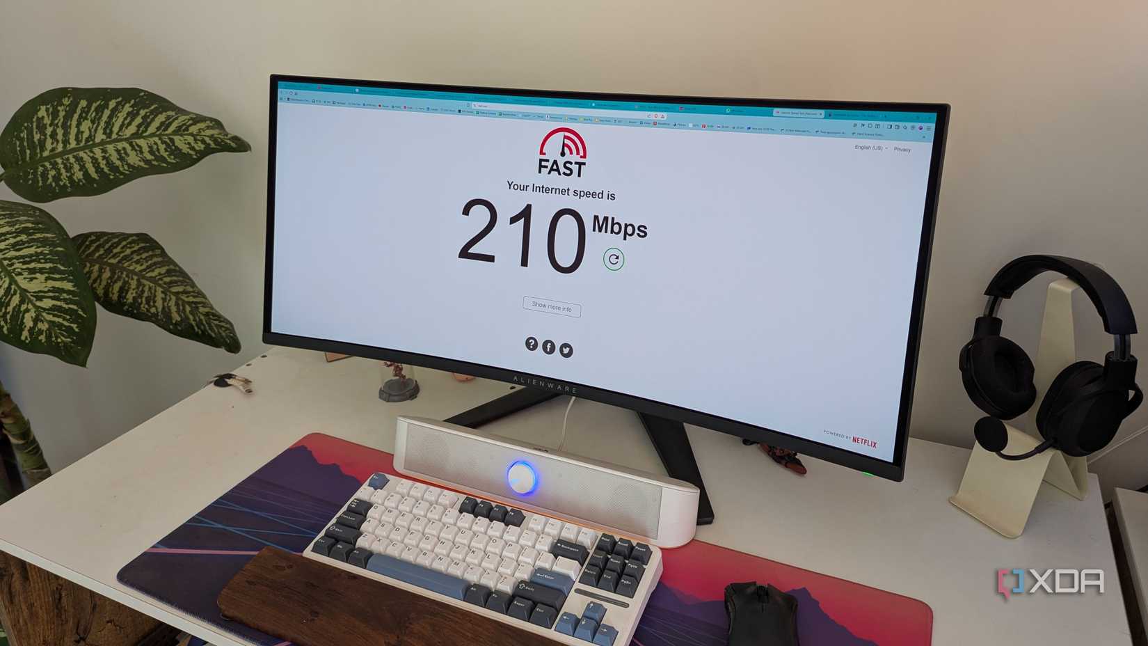 PC setup showing monitor with website to check internet speed