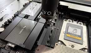 screwing down threadripper motherboard to test bench