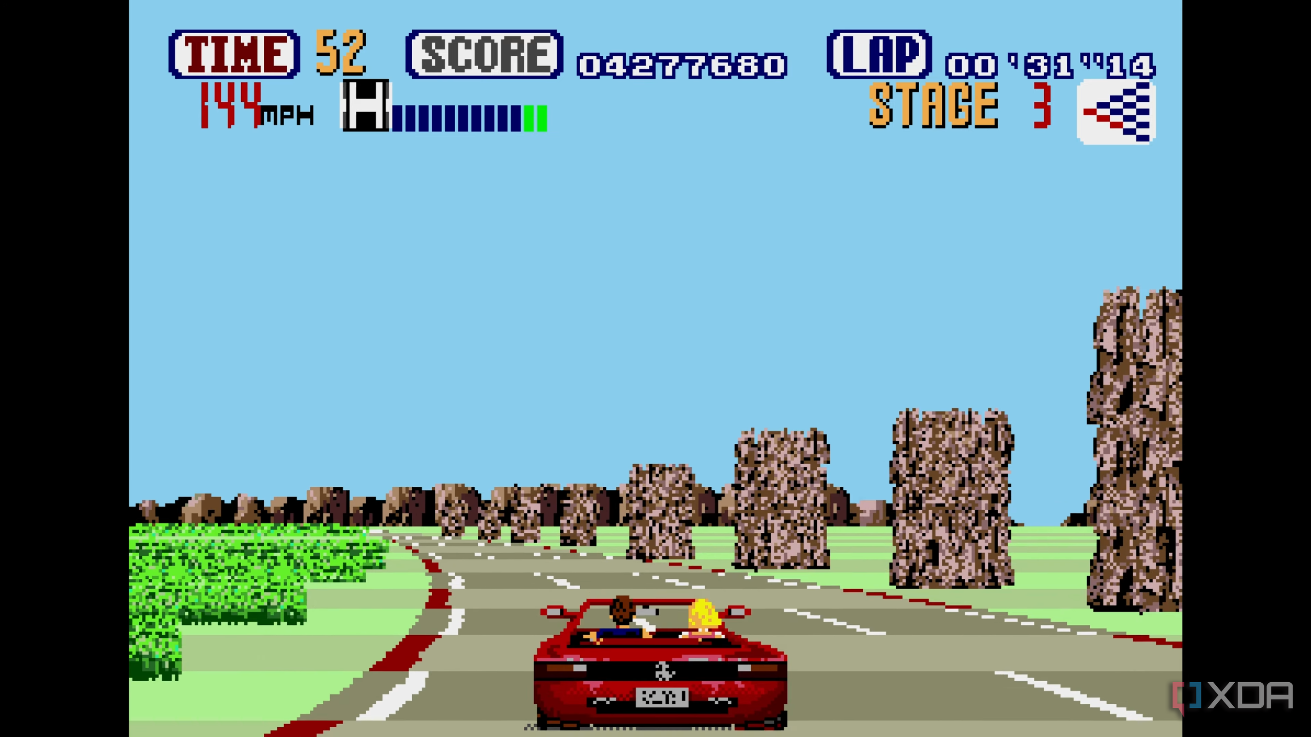 Driving the Ferrari Testarossa in Sega OutRun.