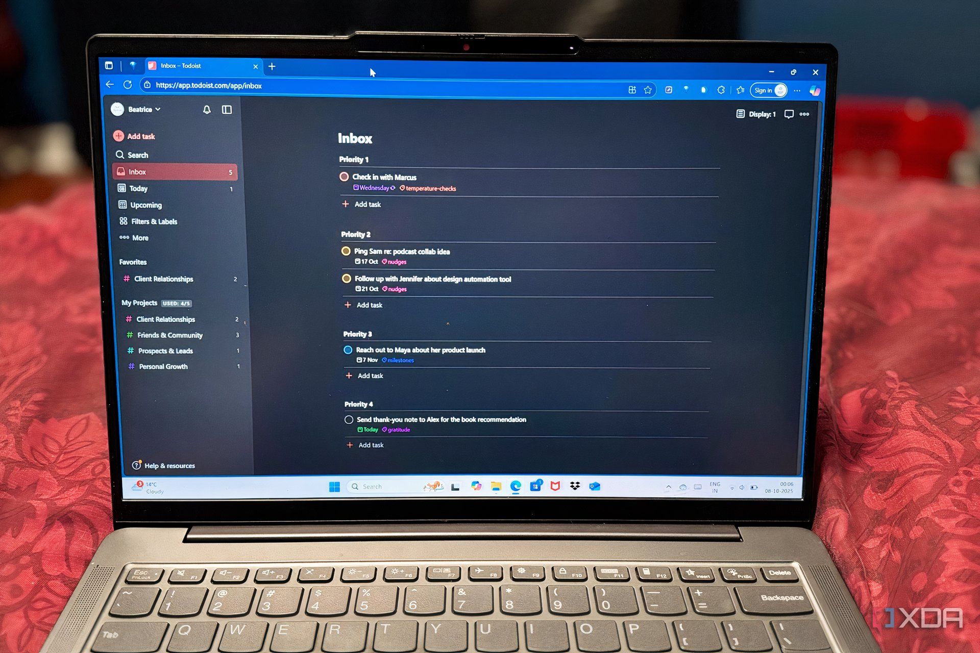 Photo of Todoist Inbox page on my laptop