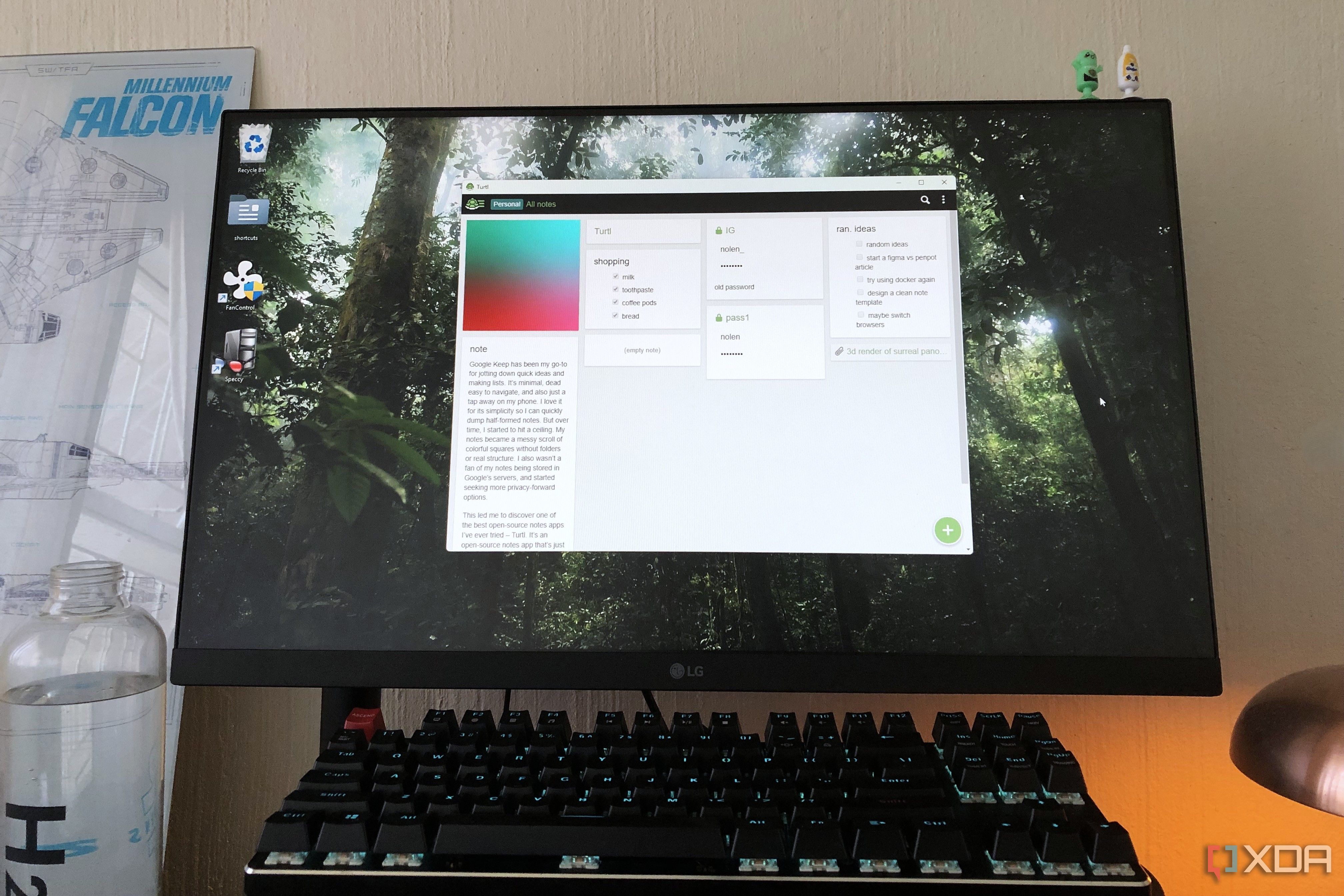 Turtl notes app on desktop pc, bottle and lamp in view