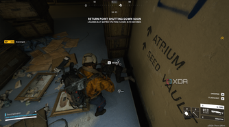 Looting a dead raider in Arc Raiders.