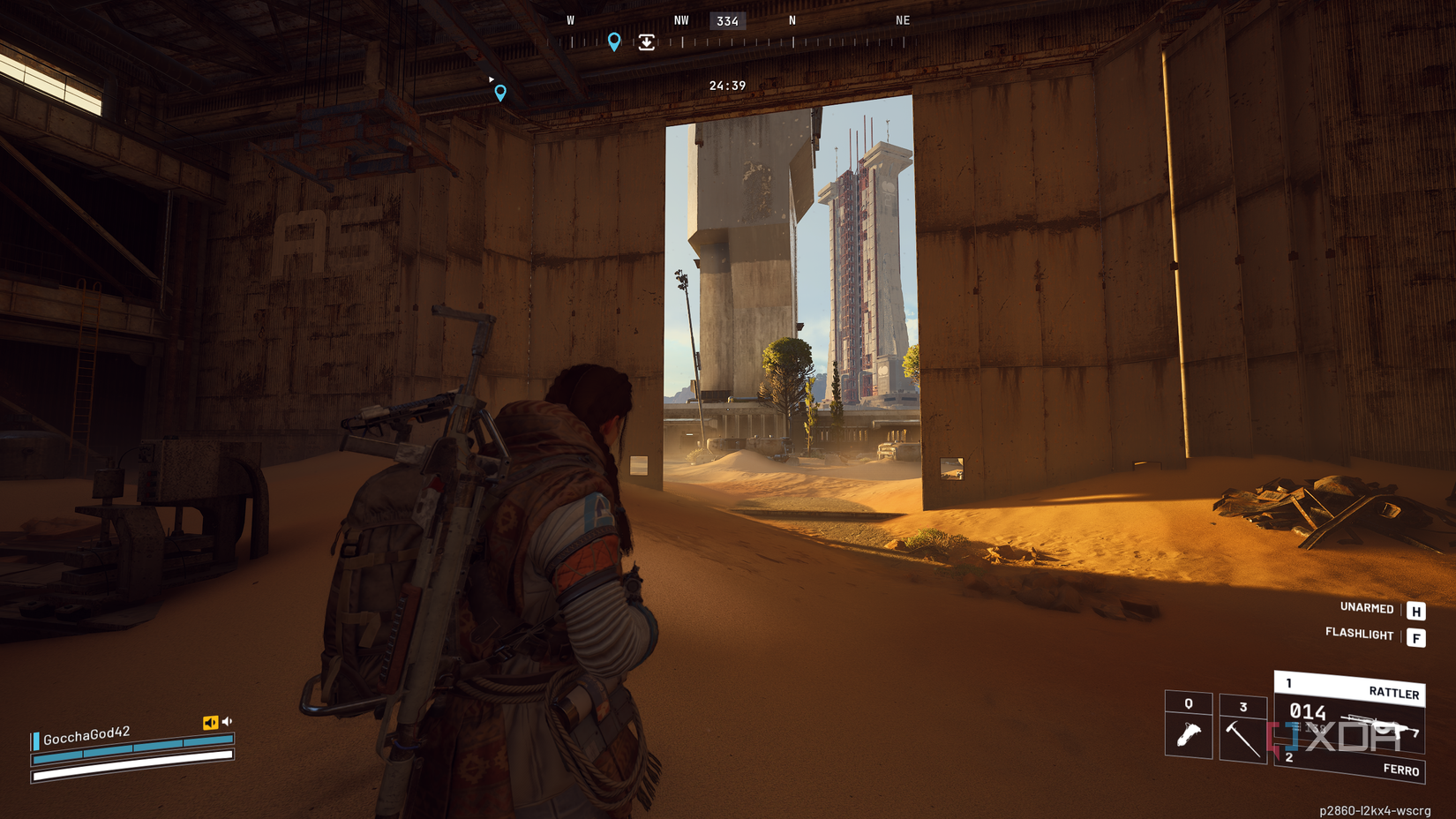 A vehicle maintenance facility overrun by sand in Arc Raiders' Spaceport map.