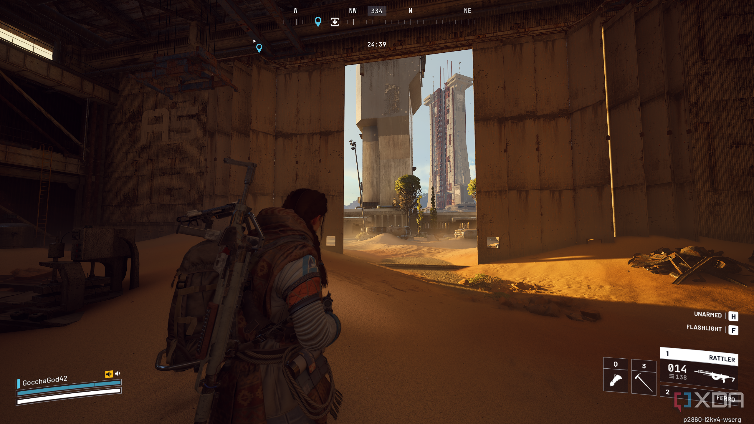 A vehicle maintenance facility overrun by sand in Arc Raiders' Spaceport map.