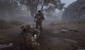 Another raider standing over a knocked-down player in Arc Raiders.