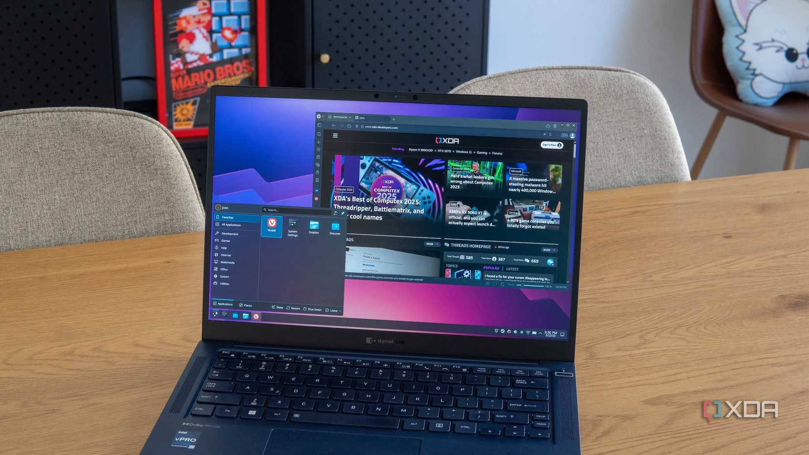 Arch Linux laptop on a wooden table