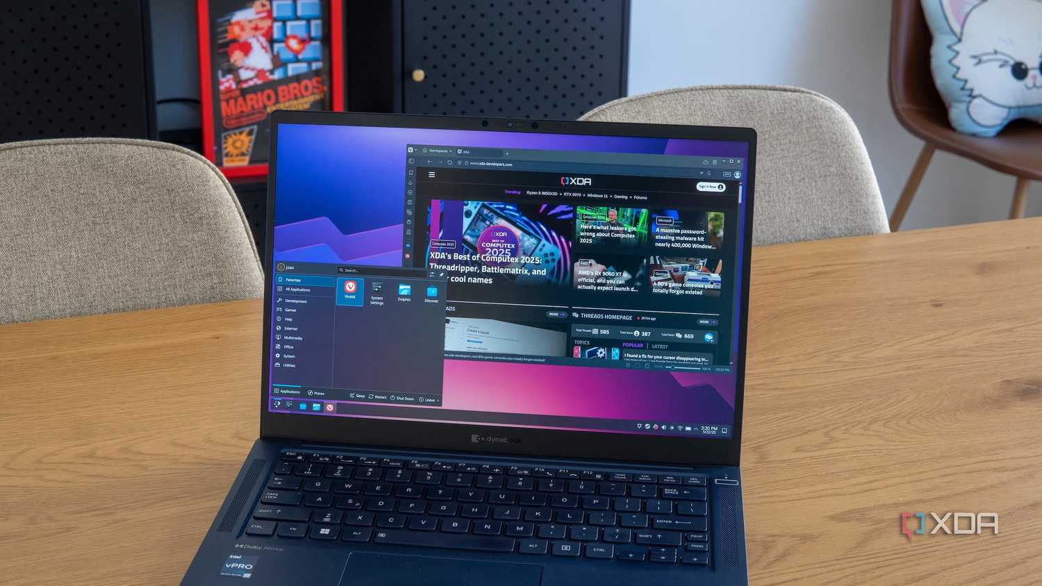 Arch Linux laptop on a wooden table