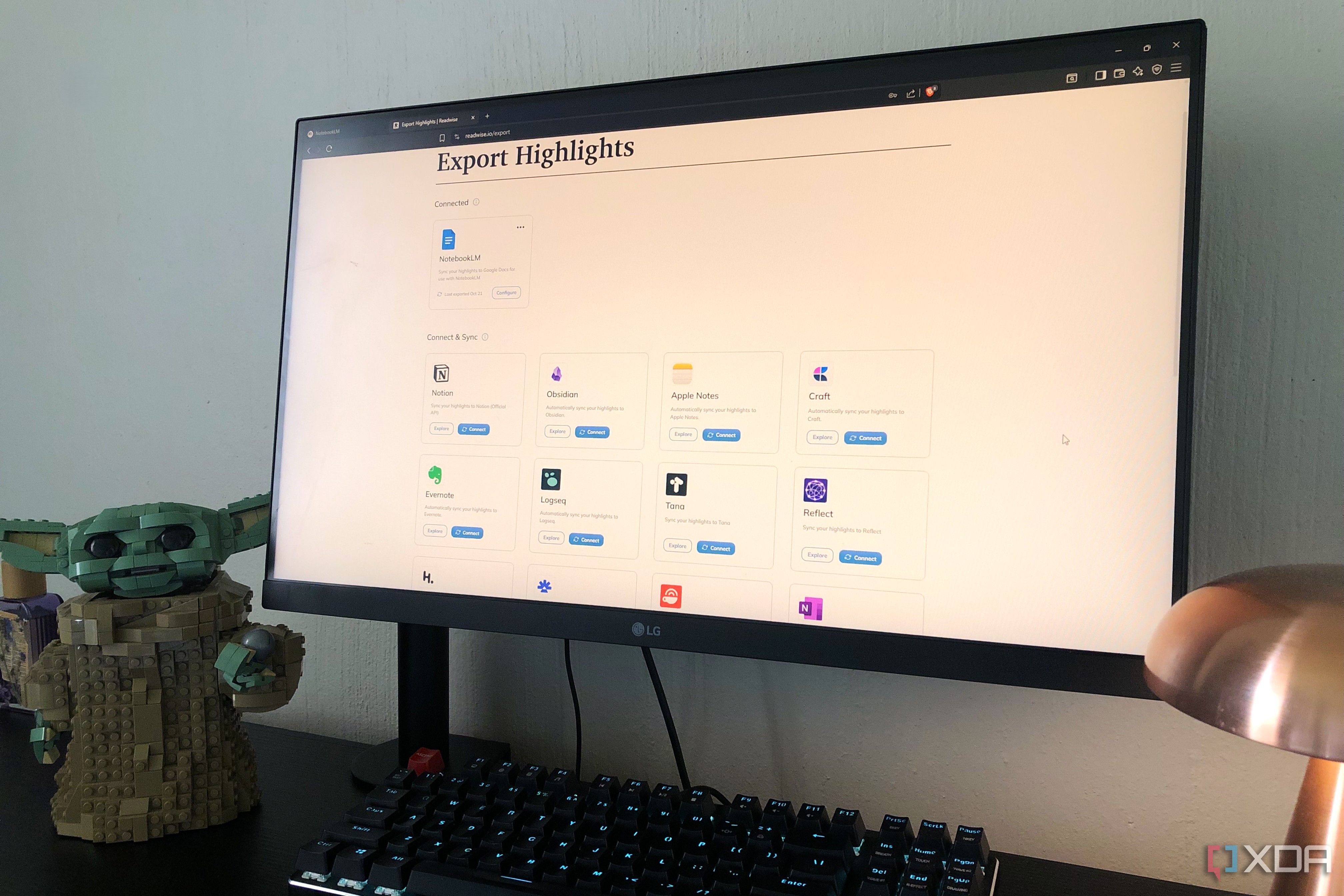 Readwise sync options on desktop pc, lego and lamp in view