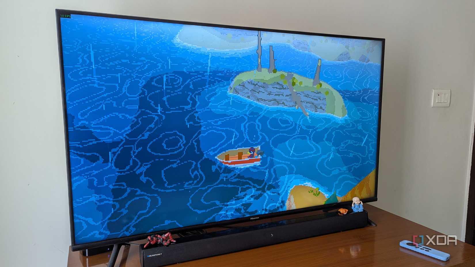 Apple TV running a game on a smart TV using Steam Link