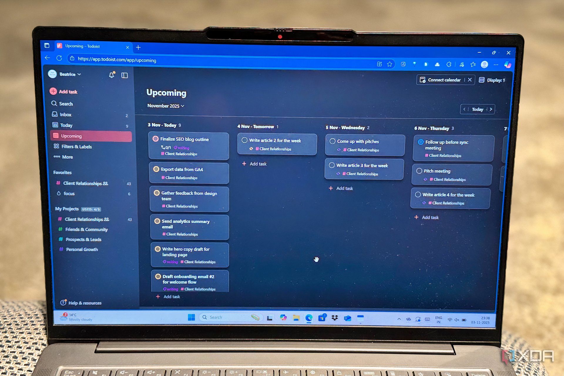 Photograph of Todoist upcoming tasks on laptop screen