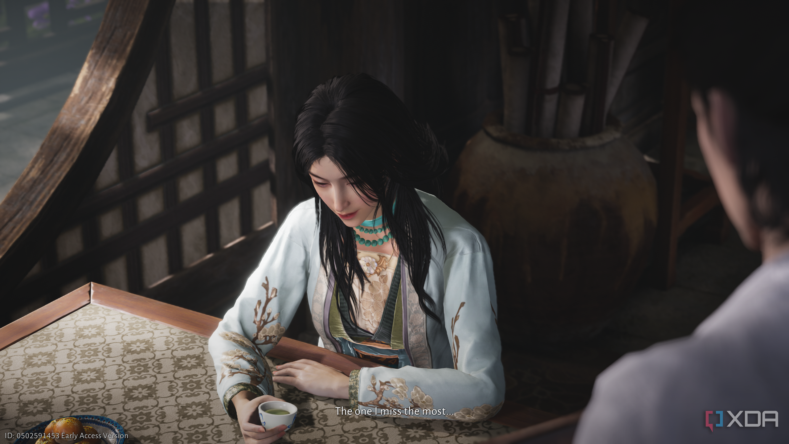A mysterious guest at the tavern in Where Winds Meet.