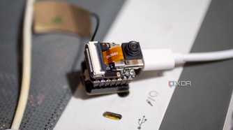 XIAO ESP32 S3 Sense on a PC case, showing Wi-Fi antenna