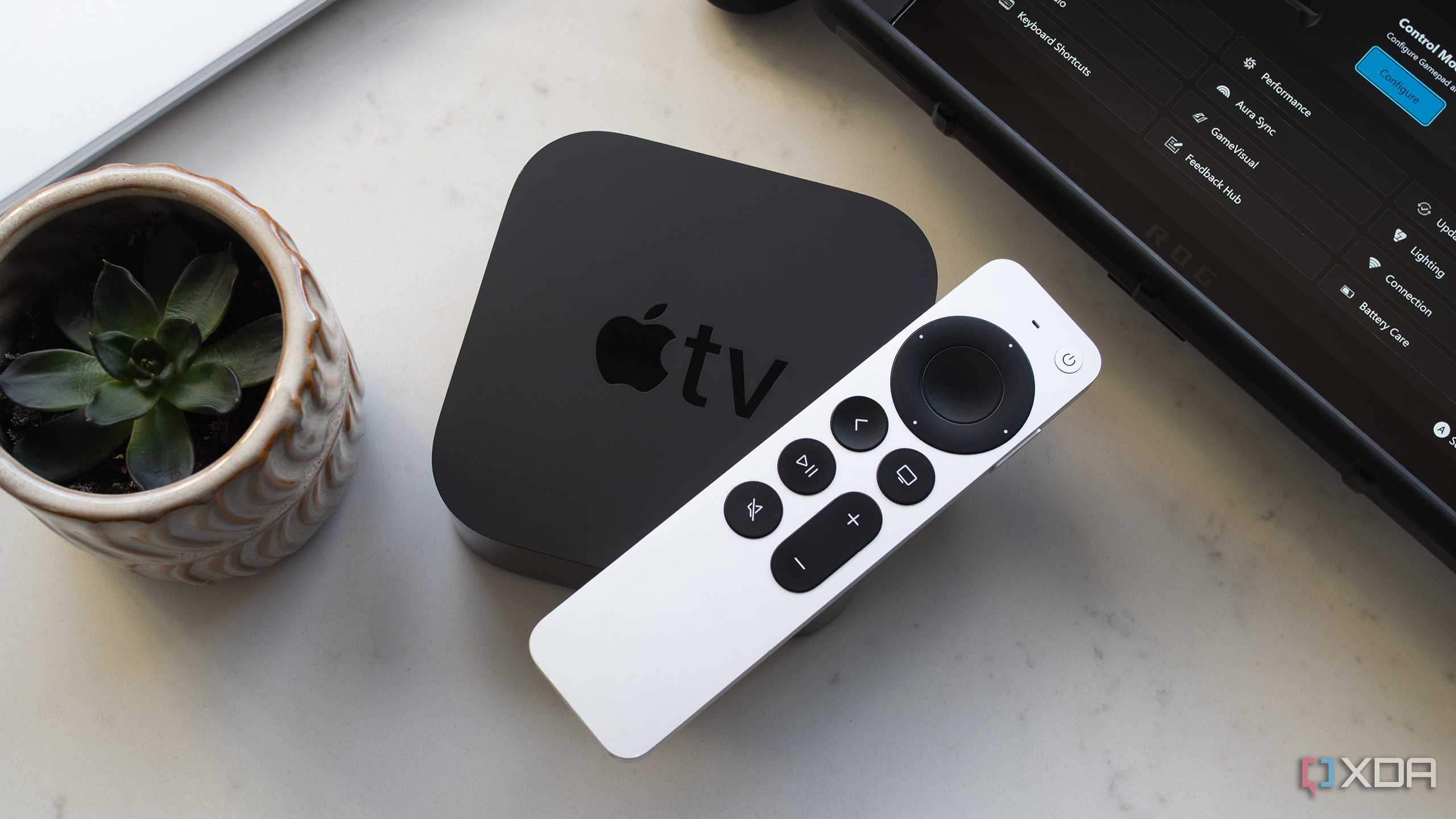 The Apple TV 4K and the Siri Remote sitting on a counter