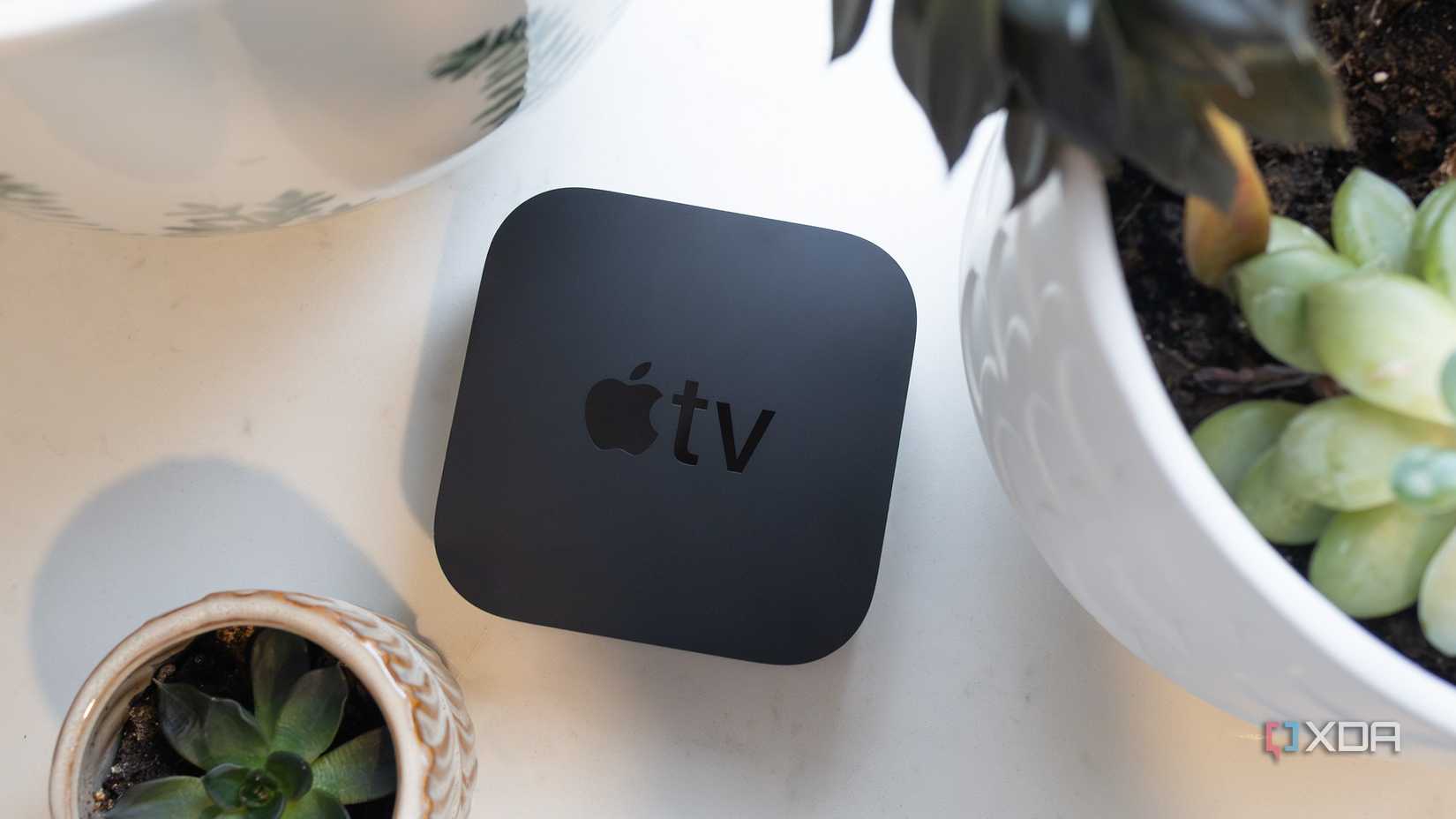 The Apple TV 4K sitting on a table 