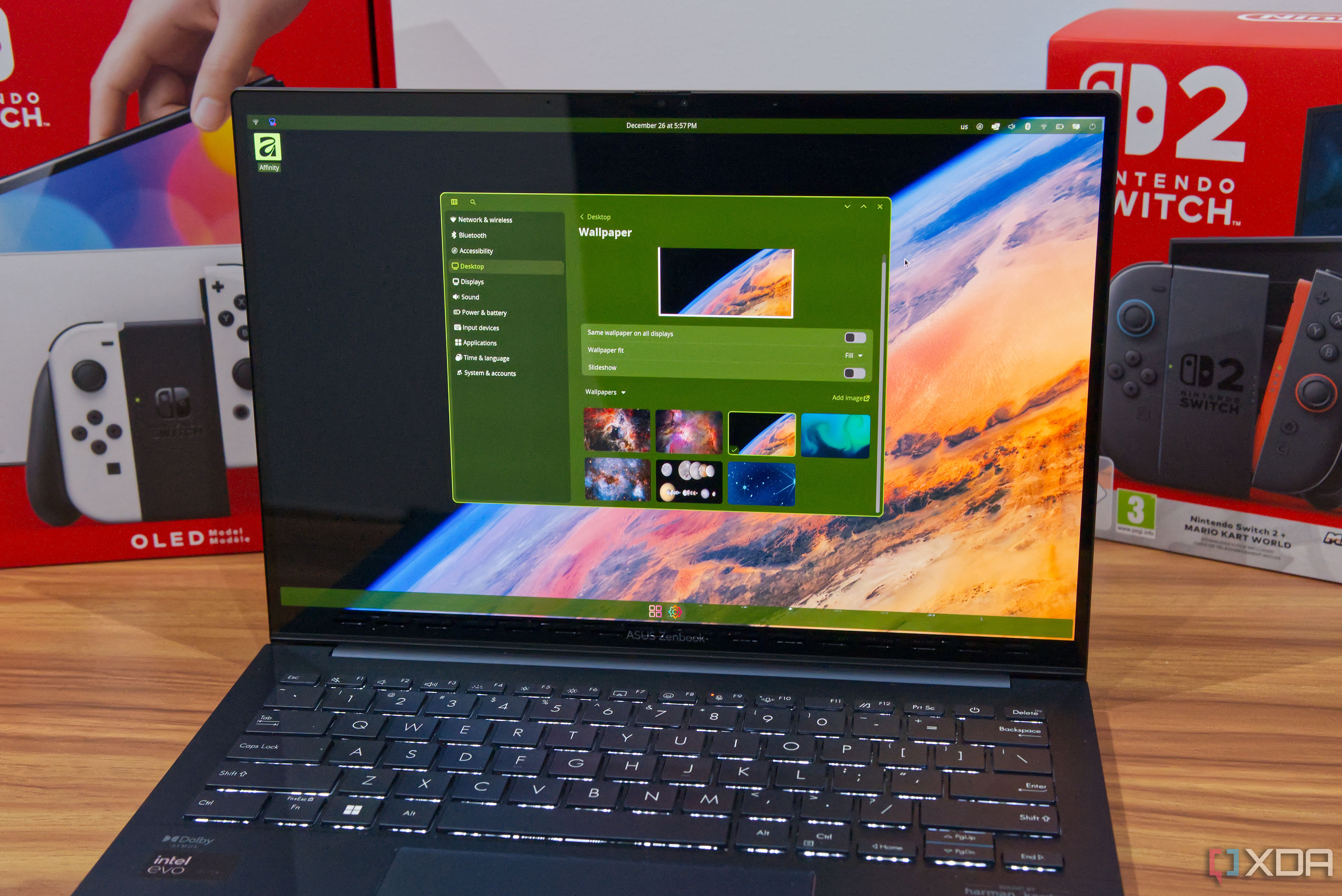 A laptop running the COSMIC desktop and showing the COSMIC Settings app