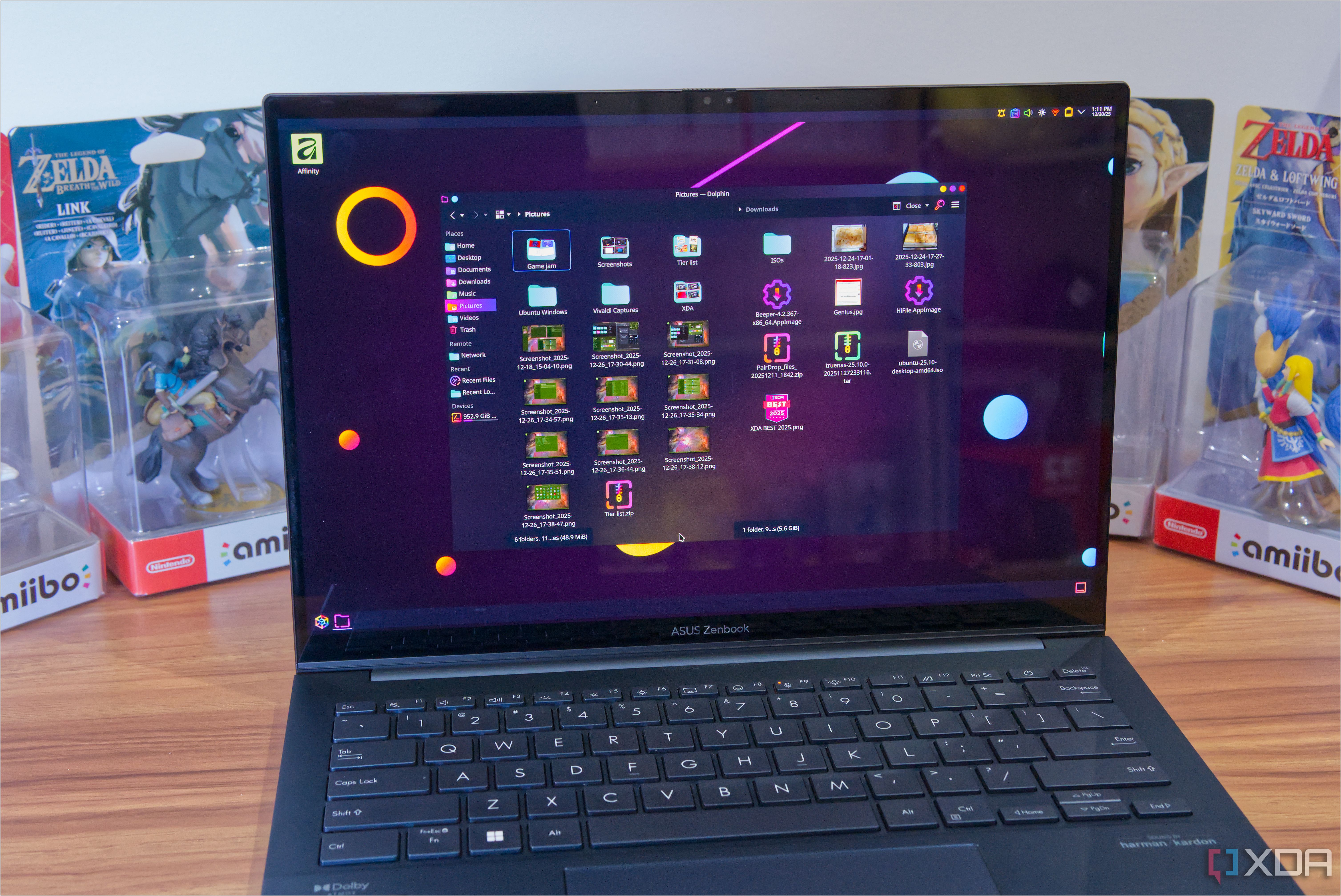 A laptop running KDE Plasma with the Dolphin file manager on screen