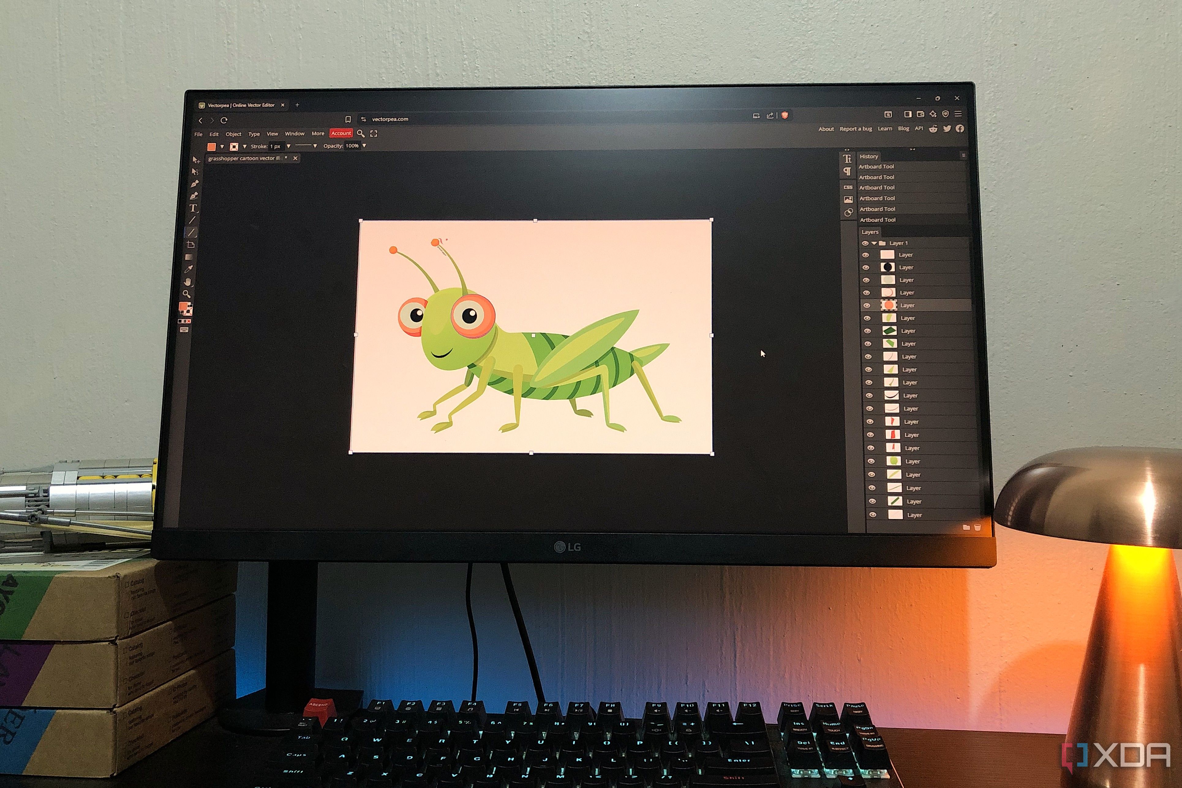Grasshopper illustration in Vectorpea on desktop pc, lamp and albums in view