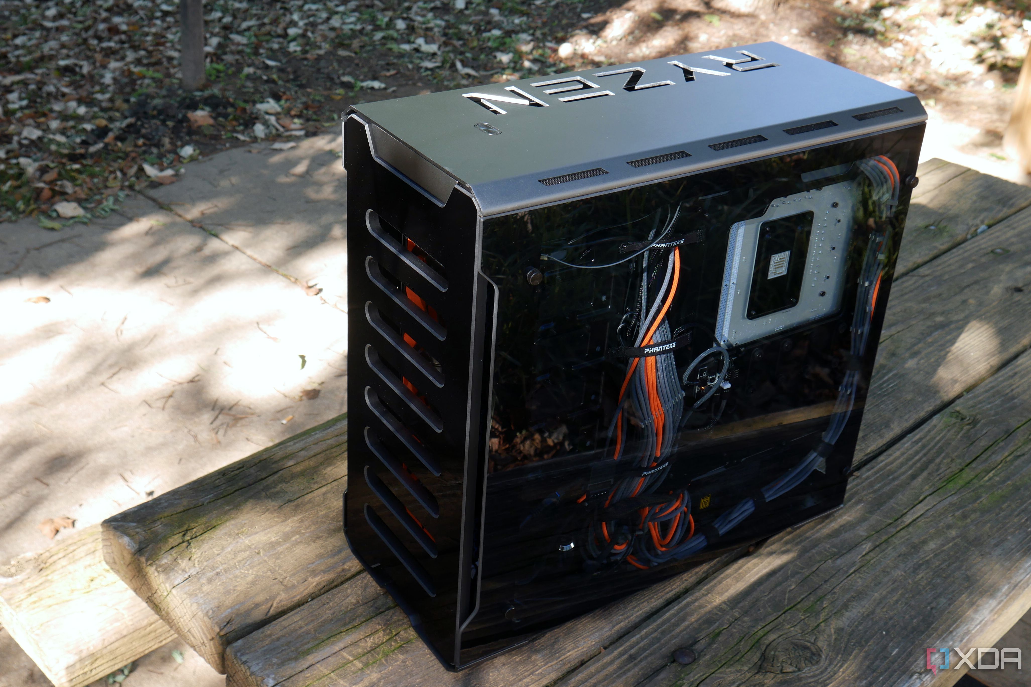 custom watercooling build shwoing rear cable area