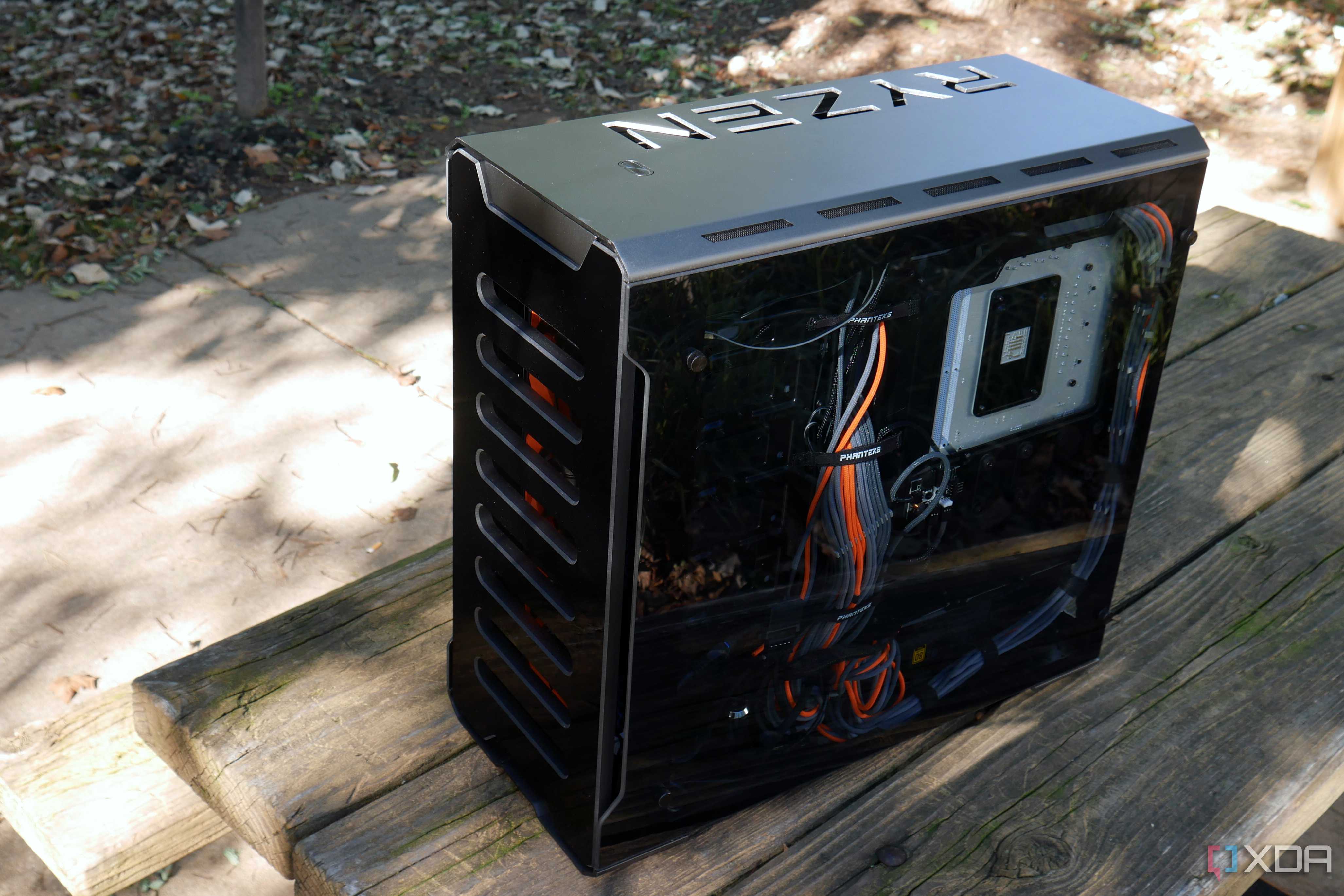 custom watercooling build shwoing rear cable area