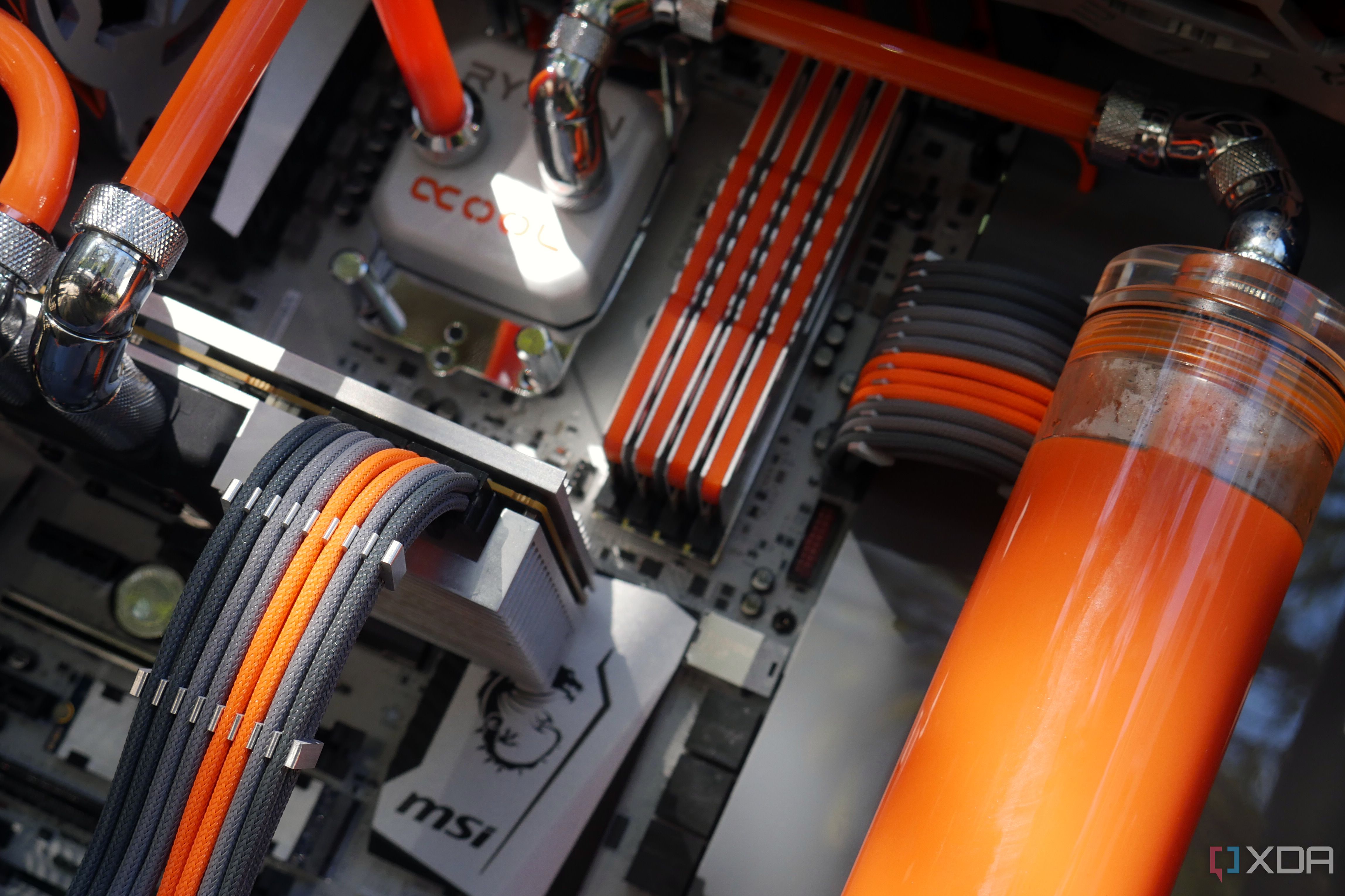 custom watercooling build inside showing custom cables and parts
