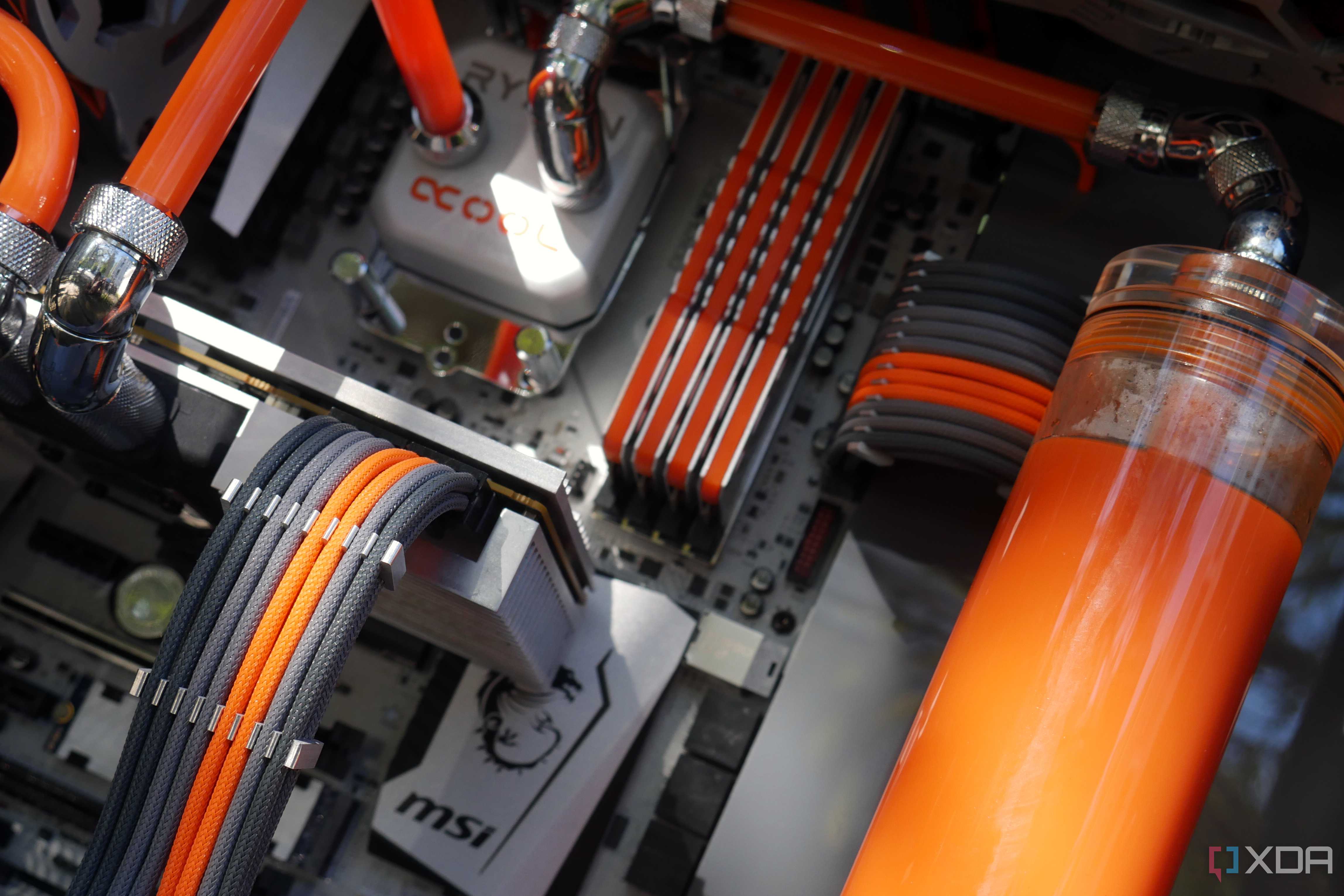 custom watercooling build inside showing custom cables and parts