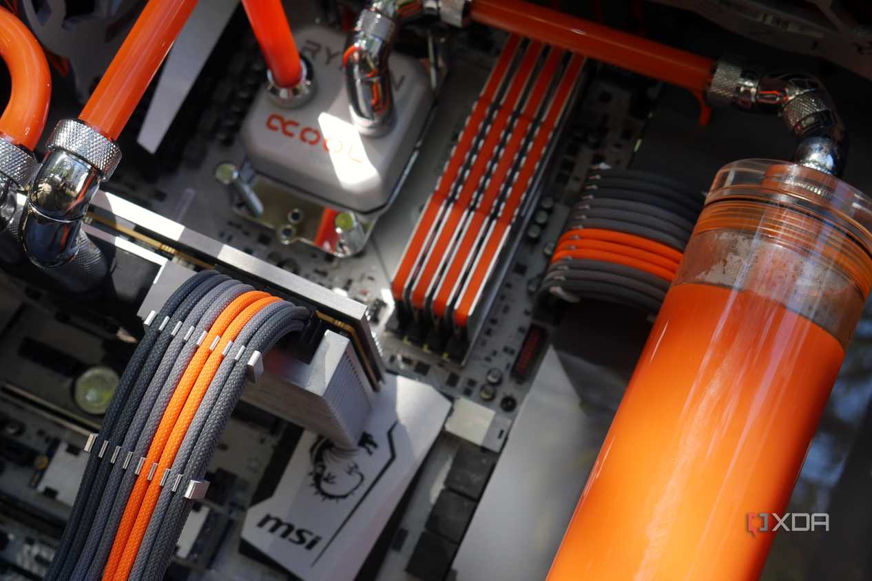custom watercooling build inside showing custom cables and parts