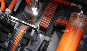 custom watercooling build inside showing custom cables and parts