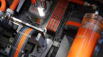 custom watercooling build inside showing custom cables and parts