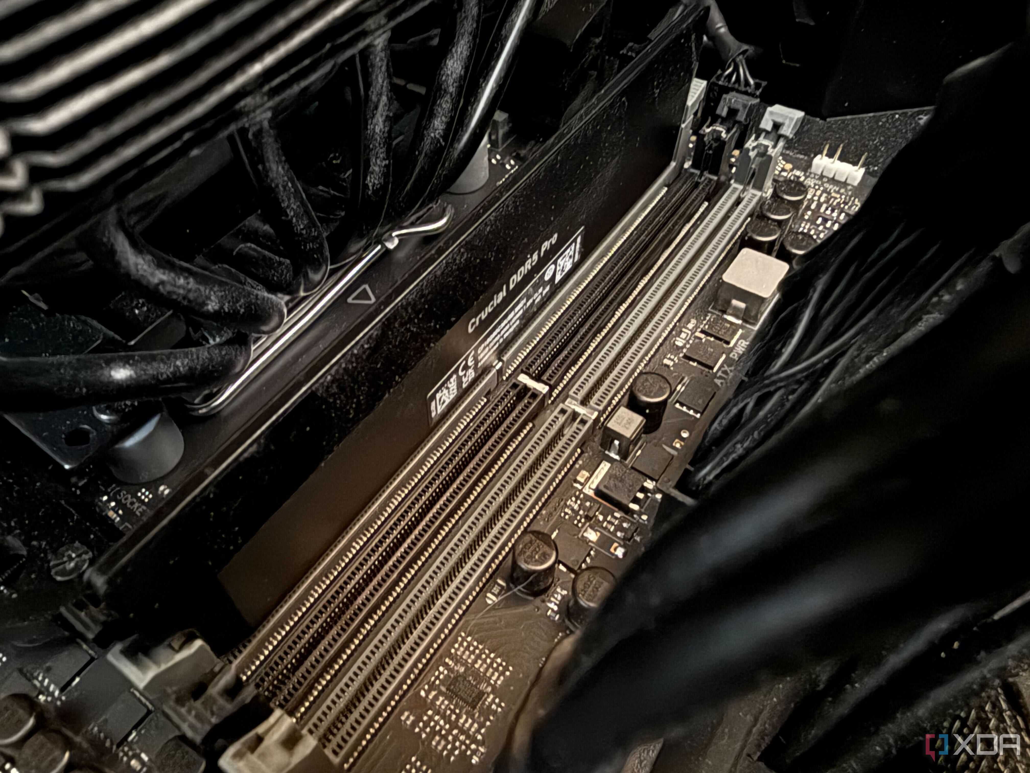 A photo of 1 stick of RAM installed in a motherboard