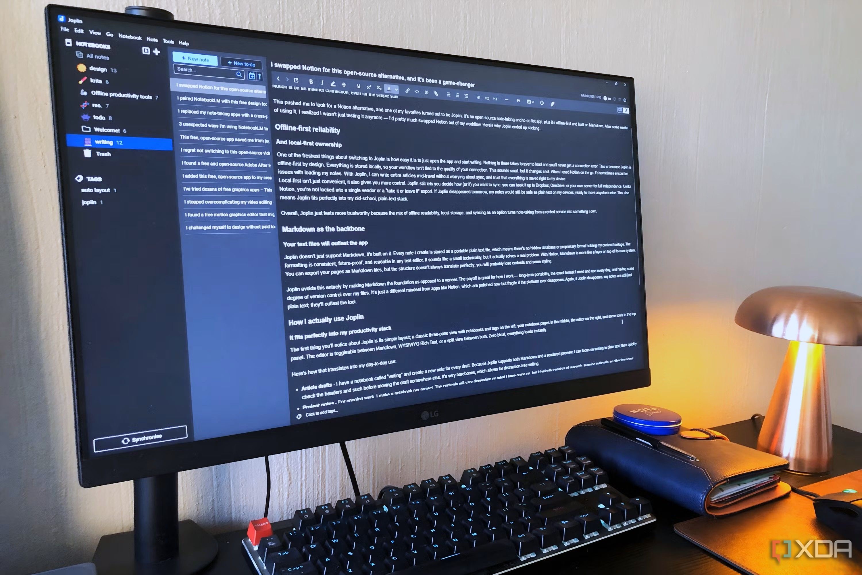 Joplin on desktop pc, lamp and book in view