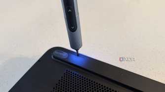 olares one mini PC for AI being opened by an electric screwdriver