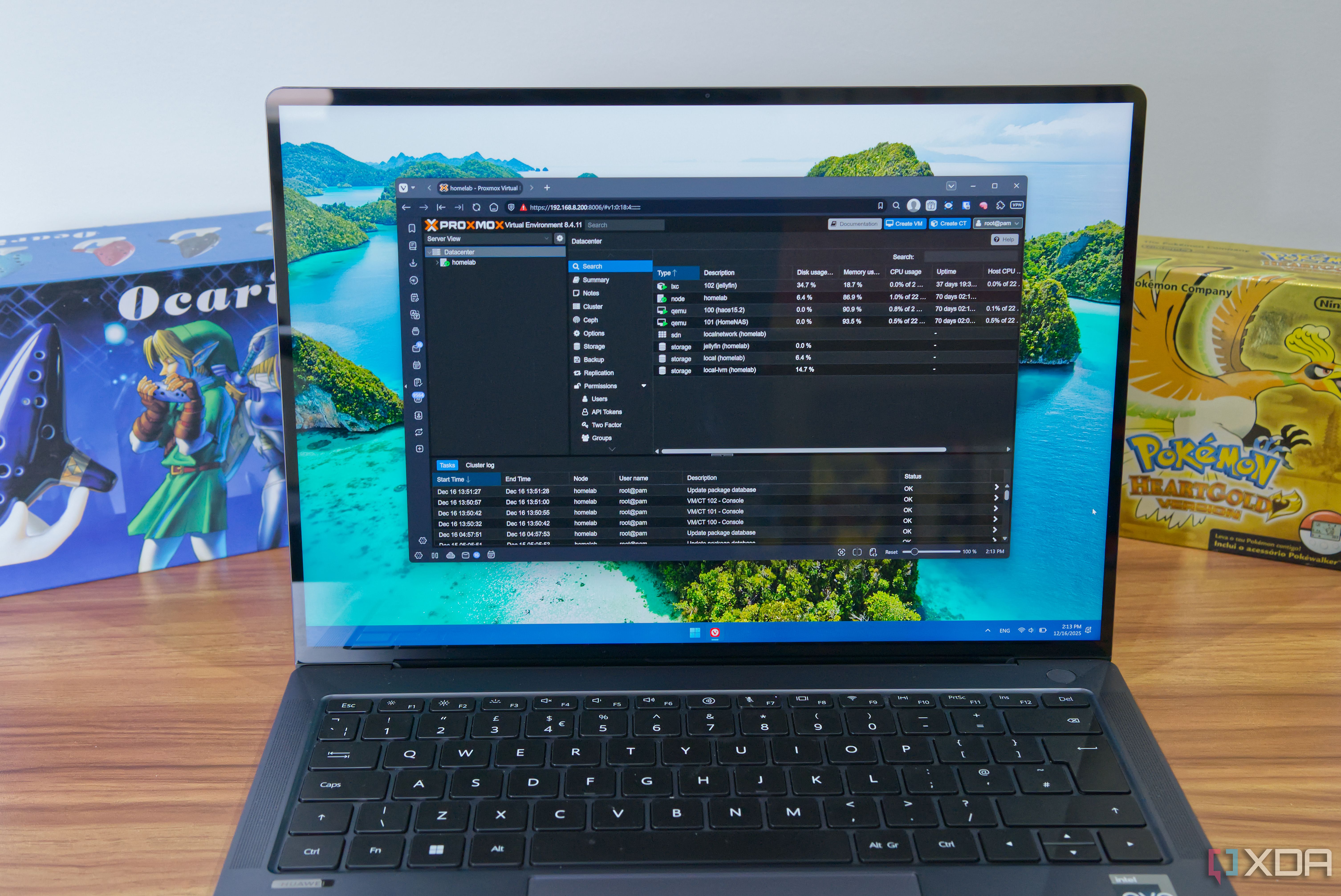A Windows 11 laptop showing a web browser with a Proxmox dashboard